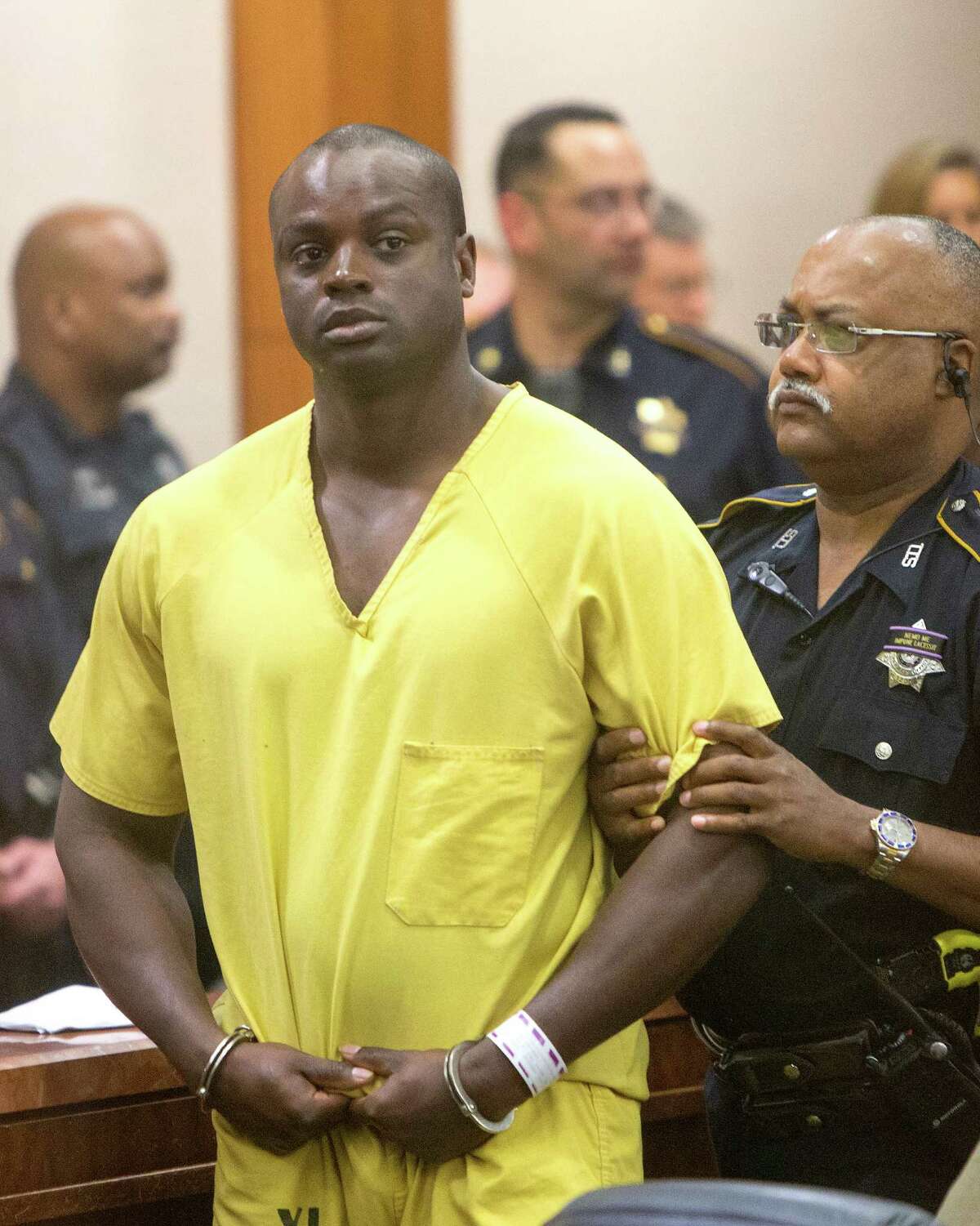 Shannon Miles appears in the 208th State District Court for his arraignment at the Harris County Criminal Courthouse, Monday, Aug. 31, 2015, in Houston. Harris County District Attorney Devon Anderson said Miles, 30, fatally shot Deputy Darren Goforth after he refueled his police cruiser at a gas station. "They found Deputy Darren Goforth face down in a pool of his own blood," Harris County District Attorney Devon Anderson told state District Judge Denise Collins.