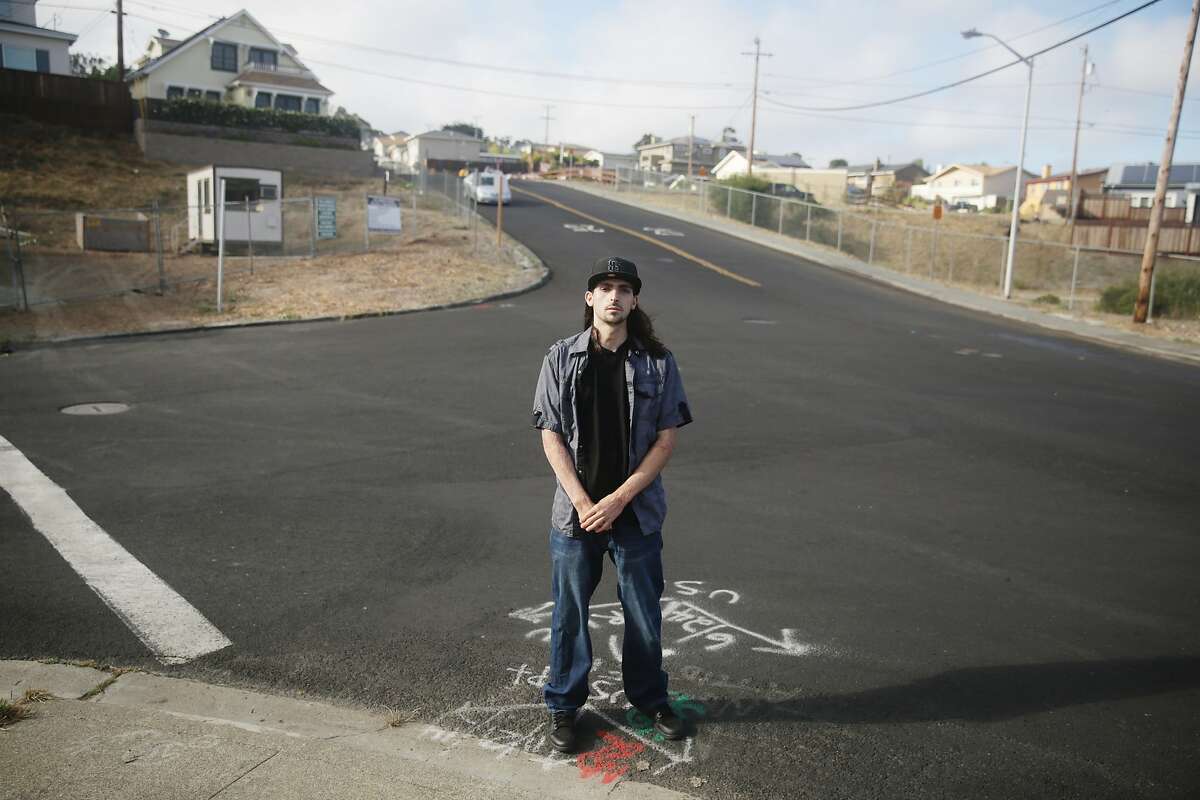 Joe Ruigomez stands at the intersection of Earl Avenue and Glenview Drive at the site of the San Bruno gas pipeline explosion on Thursday, July 23, 2015 in San Bruno, Calif. Joe Ruigomez, who was the closest to the explosion, nearly died in the San Bruno gas pipeline explosion.