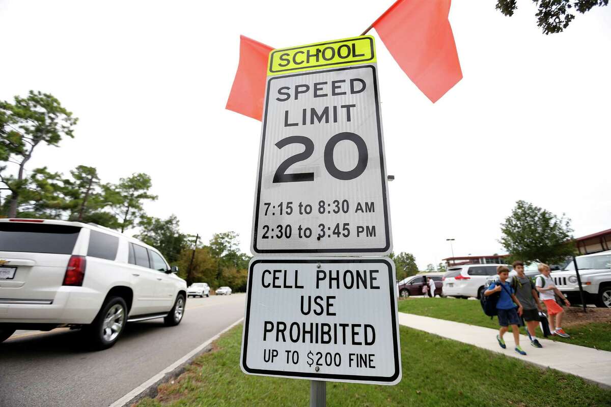Spring Branch's Frostwood Elementary has a cell-phone sign as it's in Bunker Hill Village. The city of Houston has no such signs because of a lack of funds.﻿