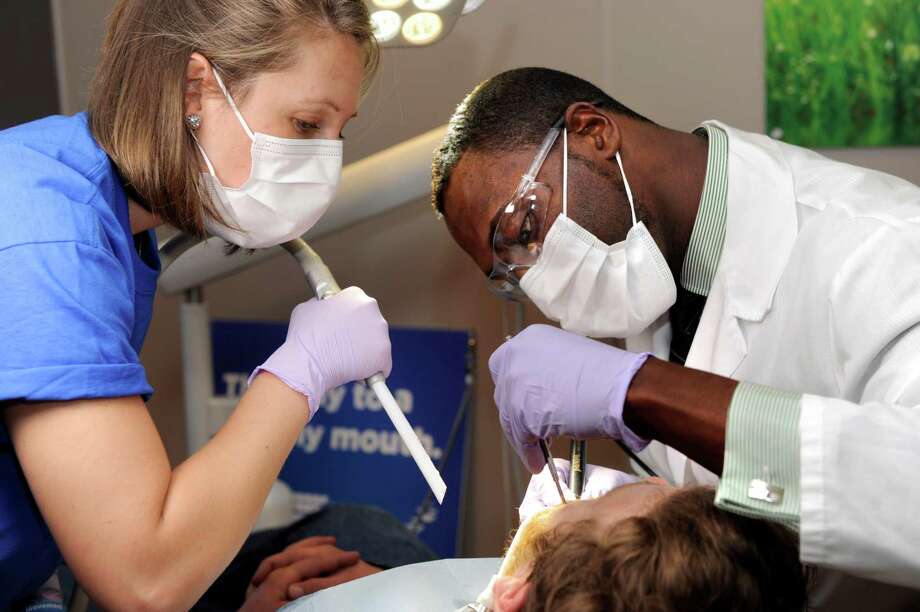 Local veterans all smiles after free dental care NewsTimes