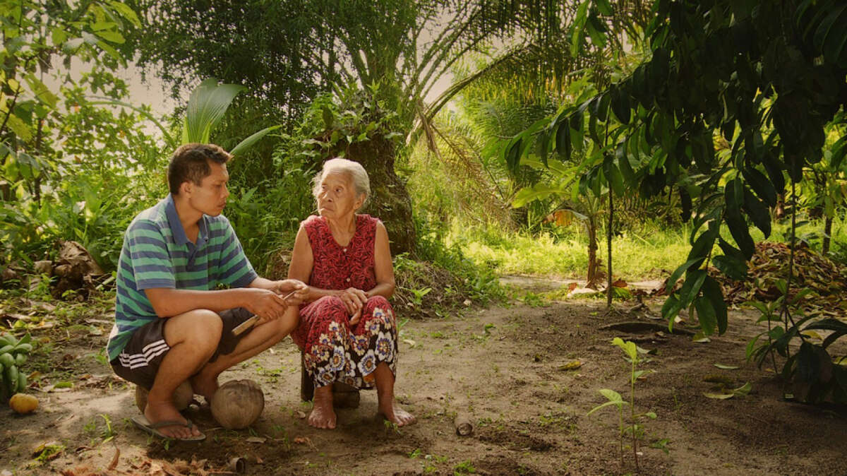 Adi Rukun and his mother, Rohani, in ?“The Look of Silence." The film focuses on the survivors of anti-Communist massacres of 1965 and 1966 in Indonesia. Illustrates INDONESIA-FILM (category i), by Adam Taylor (c) 2015, The Washington Post. Moved Monday, July 20, 2015. (MUST CREDIT: Courtesy of Drafthouse Films and Participant Media.)