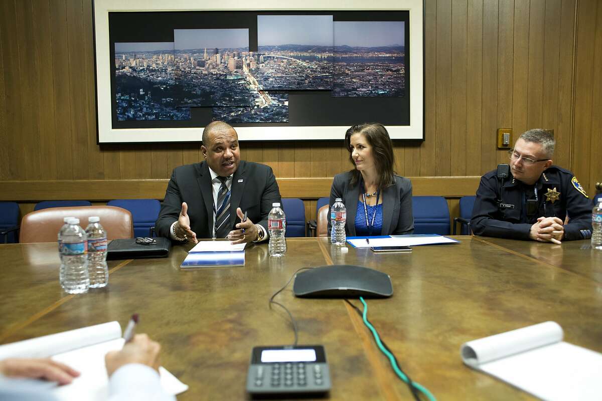 Oakland Mayor Libby Schaaf, center, and Oakland Chief of Police Sean Whent listen as Ron Davis, far left, executive director of President Obama?•s Task Force on 21st Century Policing, makes a point during an editorial board meeting at the Chronicle on September 3, 2015 in San Francisco, Calif.