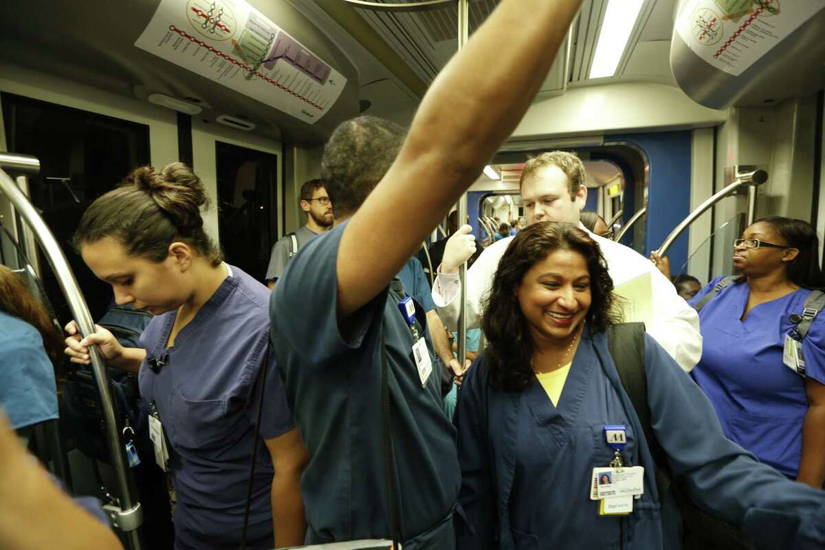 Early morning commuters ride the Metrorail to the Texas Medical Center. Health care remains a bright spot in Houston's economy. ( Steve Gonzales / Houston Chronicle )