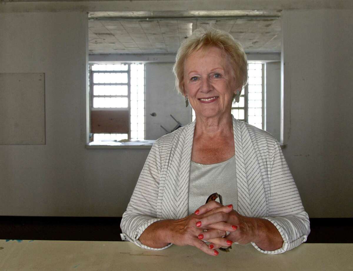 Newtown First Selectman Patricia Llodra stands inside Canaan House, a 220,000-square foot building on the Fairfield Hills Campus that is planned for demolition later this month. Wednesday, September 2, 2015, in Newtown, Conn.