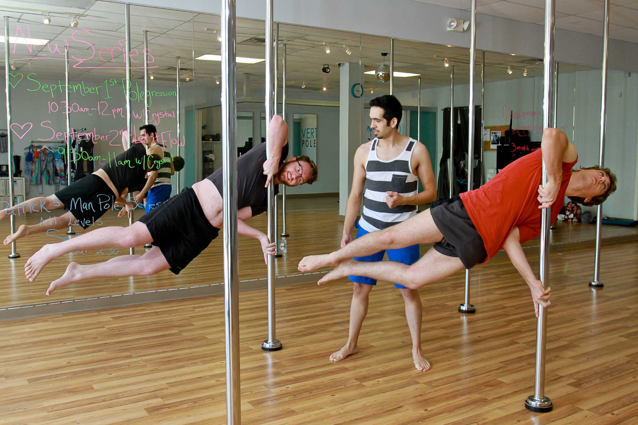 Men seeking workout challenge take pole-dancing class for a spin.