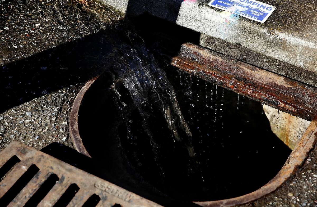 The Public Utilities Commission's sewer operations department uses recycled water to flush out catch basins in preparation for El Nino rains in San Francisco, Calif., on Friday, September 4, 2015.
