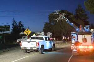 Truck crash, downed power lines close southbound I-880 to...