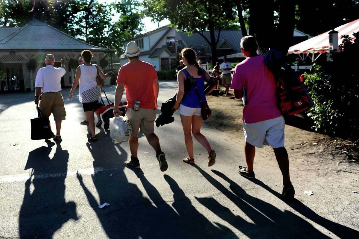 Racing fans make their way home after the final day of the season on Tuesday, Sept. 7, 2015, at Saratoga Race Course in Saratoga Springs, N.Y. (Cindy Schultz / Times Union)