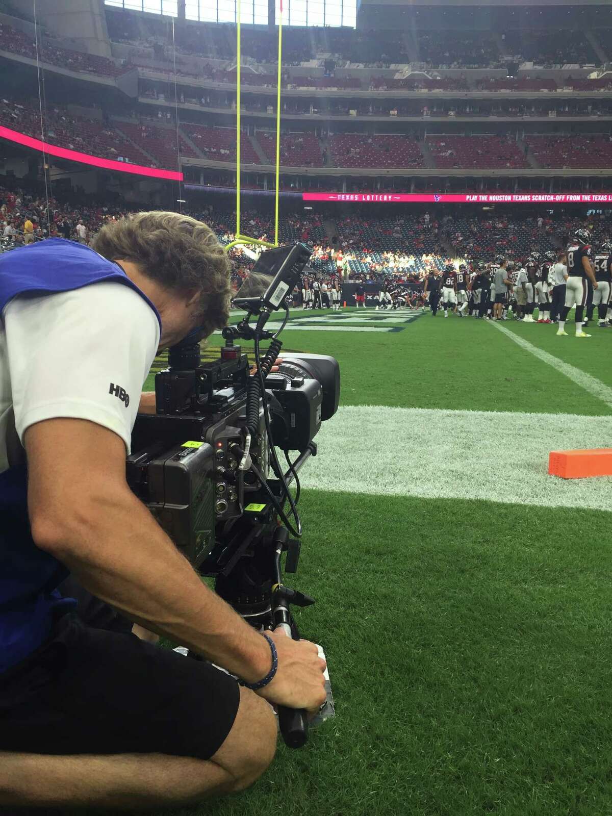 Hard Knocks crew members film the Texans for the HBO series.
