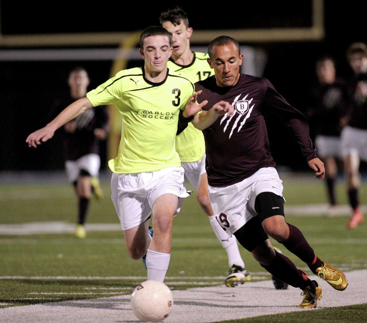 Barlow's Dan Dolan (3) and Bethel's Jimmy Oates battle for the ball during last year’s SWC boys soccer championship game at Newtown High School. Barlow won 1-0 to earn its fifth title in 10 years.