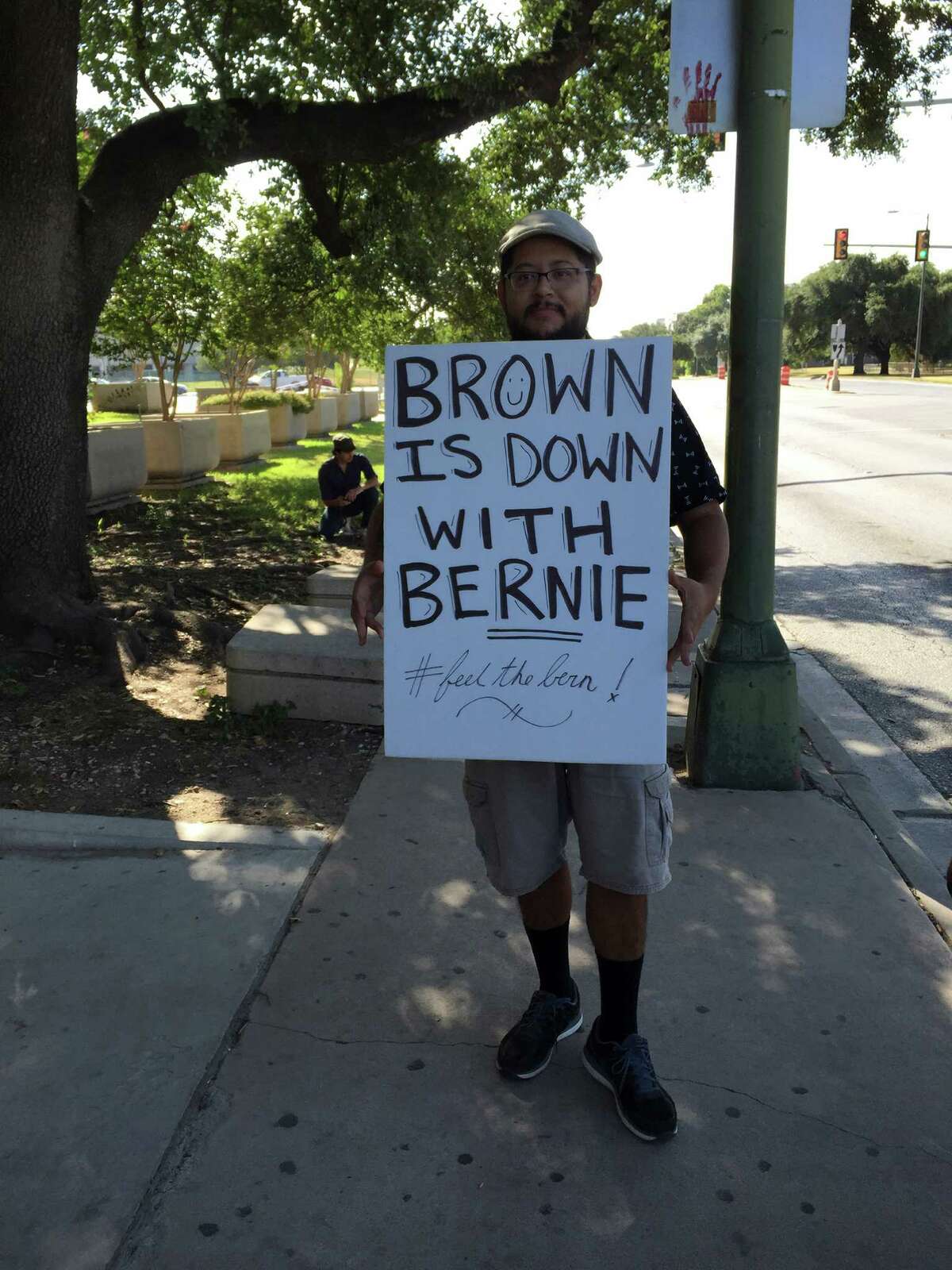 Ernest Gonzales expresses his support for Bernie Sanders at downtown Labor Day rally.