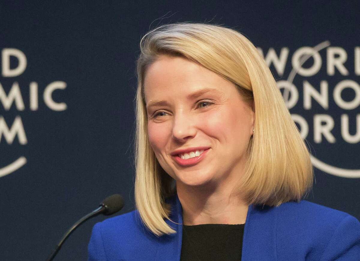FILE - In this Wednesday, Jan. 22, 2014, file photo, Yahoo CEO Marissa Mayer smiles during a session at the World Economic Forum in Davos, Switzerland. Mayer posted on Tumblr, Monday, Aug. 31, 2015, that she's pregnant with twin girls, due in December. (AP Photo/Michel Euler, File)