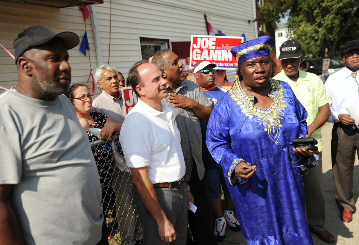 The Rev. Mary Lee speaks in support of former Bridgeport mayor and current mayoral candidate Joseph P. Ganim outside his campaign headquarters at 12 Hudson St. in Bridgeport on Tuesday. An earlier news conference had accused Ganim of support and advocacy on behalf of a member of the Ku Klux Klan.