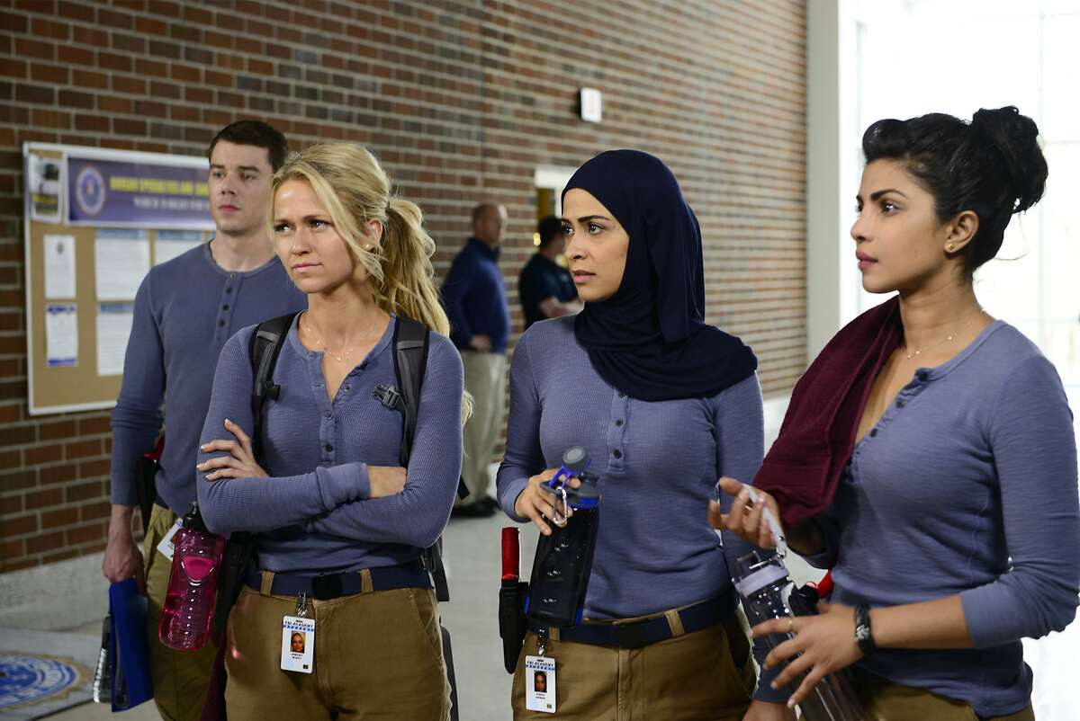 In this image released by ABC, Brian J. Smith, from left, Johanna Braddy, Yasmine Al Massri and Priyanka Chopra appear in a scene from "Quantico," premiering Sept. 27. (