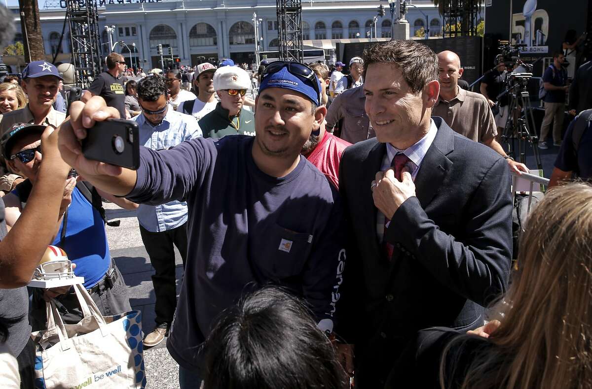 Randal Dale, (left) of Pacheco snagged a selfie with 49er quarterback great Steve Young as the NFL and the Bay Area Super Bowl Committee officially kicked off the football season with an event at Justin Herman Plaza on Tues. September 9, 2015, in San Francisco, Calif. San Francisco will host Super Bowl 50 in Santa Clara at the end of the NFL season.