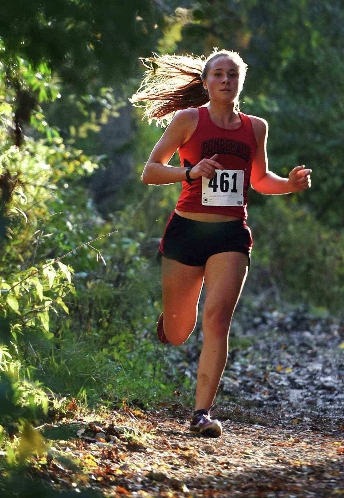 Pomperaug's Sara Tarascio runs in the high school girls SWC cross country championship at Bethel High School in Bethel, Conn. Friday, Oct. 17, 2014. Tarascio finished fourth overall as New Fairfield edged out Pomperaug to win the team event championship.