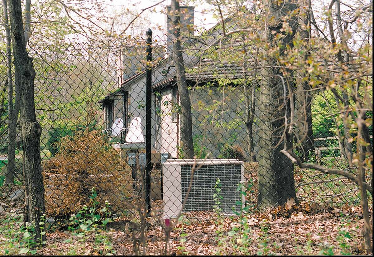 Greenwich, May 4, 2000. This view of Martin Frankel's house off Lake Avenue shows the satellite dishes that provided him with direct links to Wall Street.. Photo/Helen Neafsey color.