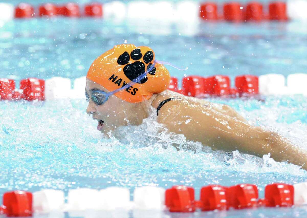 Sophie Hayes of Ridgefield competes in the 100 butterfly event during the FCIAC Girls High School Swimming Championship at Greenwich High School, Greenwich, Conn., Thursday, Oct. 30, 2014. Darien won the meet taking the championship over New Canaan, the second place finisher.