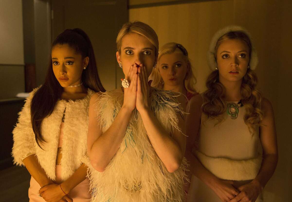 In this image released by Fox, Ariana Grande, from left, Emma Roberts, Abigail Breslin and Billie Lourd appear in a scene from "Scream Queens."