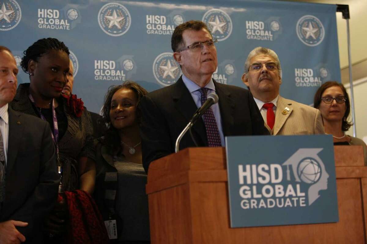 HISD Superintendent Terry Grier, flanked by members of the school board, announced Sept. 10, 2015, that he would step down in 2016. The trustees shown, from left, are Greg Meyers, Wanda Adams, Mike Lunceford, Rhonda Skillern-Jones, Manuel Rodriguez Jr. and Anna Eastman.