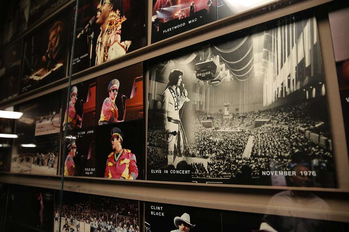 Photos of artists that have played the Cow Palace over the years include, Elton John, Elvis Presley and Stevie Wonder, are seen on the walls of the arena at the event center in Daly City, Calif., on Thurs. September 10, 2015.