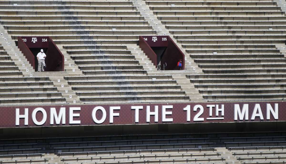 The original Home of the 12th Man sign from the old stadium before the start of a college football game at Kyle Field on Saturday, Sept. 12, 2015. ( Karen Warren / Houston Chronicle )