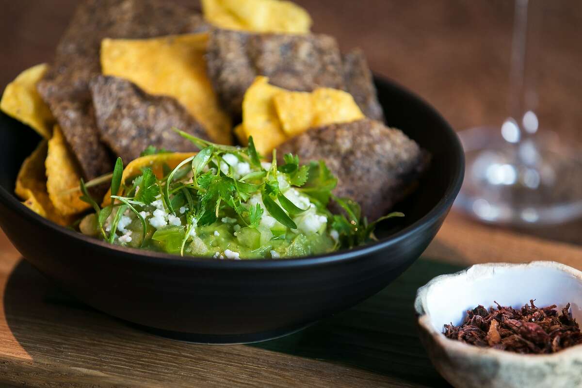Guacamole and chips can be served with crispy grasshoppers at Calavera.