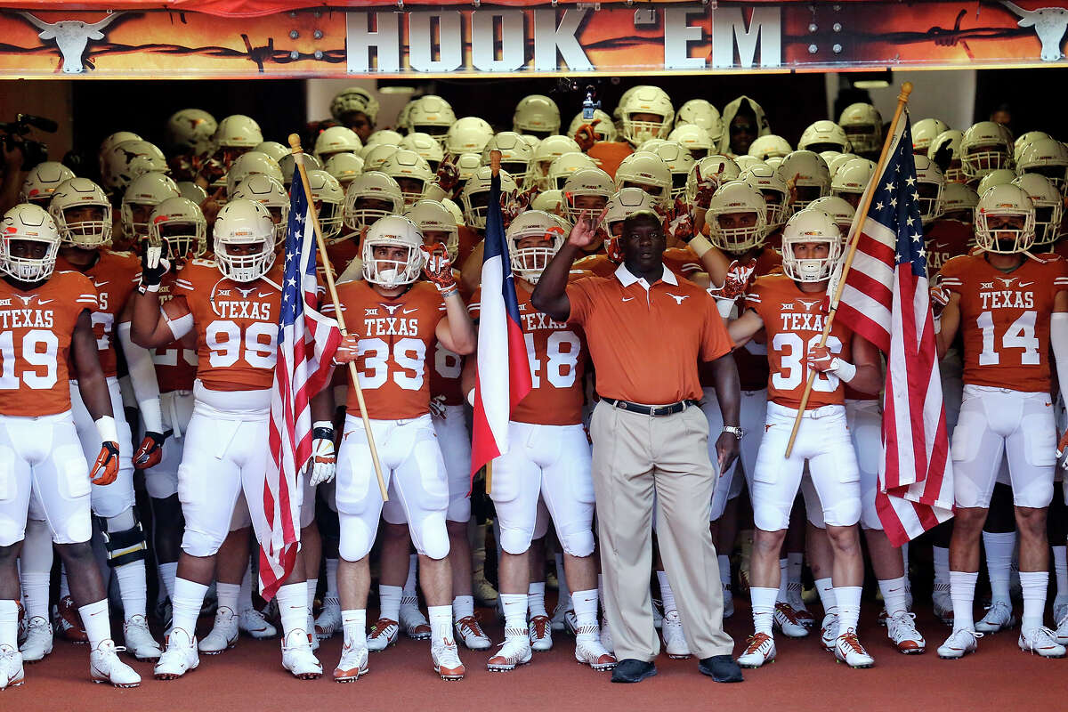 Members of the Texas Longhorns football team prepare to take the field before the game with Rice Saturday Sept. 12, 2015 at Texas Memorial Stadium in Austin, Tx.