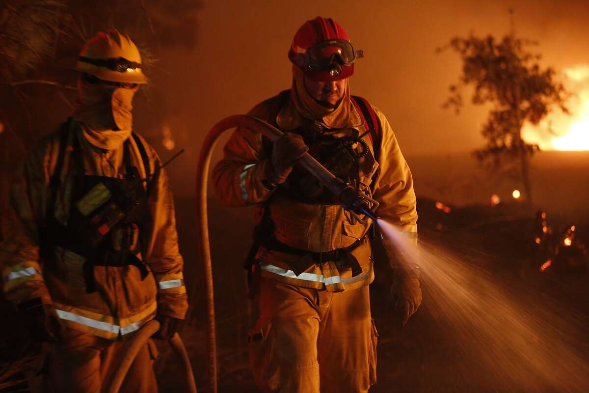 Homes destroyed, 4 firefighters injured in Valley Fire in Lake County