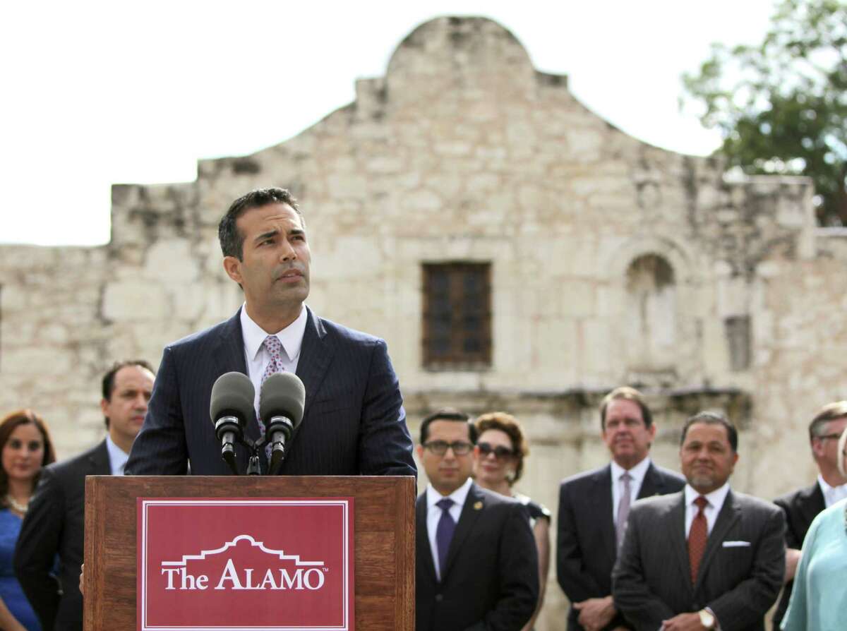 Texas Land Commissioner George P. Bush, backed by state and local elected leaders, speaks in front of the Alamo Wednesday Sept. 2, 2015 before a tour of the Alamo grounds. Bush was in San Antonio to celebrate the $31.5 million the General Land Office received to help preserve and develop the Alamo.