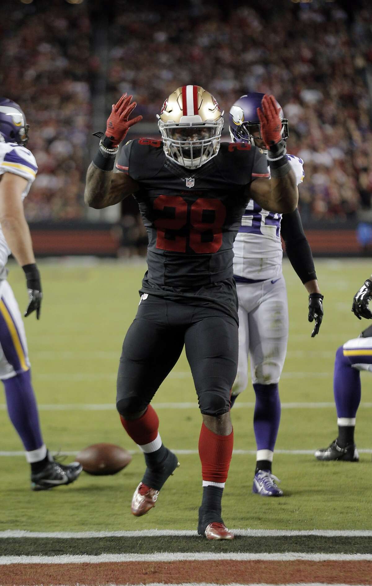 Carlos Hyde (28) reacts after a run that brought the 49ers to within yards of the end zone in the first quarter during the 49ers game against the Minnesota Vikings at Levi's Stadium in Santa Clara, Calif., on Monday, September 14, 2015.