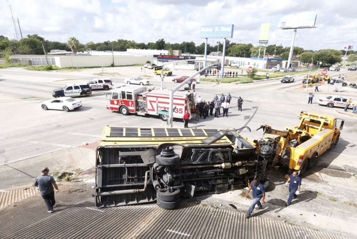 Two students died Tuesday morning when a school bus veered from the 610 Loop in southeast Houston. The wreck occurred about 7 a.m. on the eastbound frontage road of the South Loop near Telephone Road.