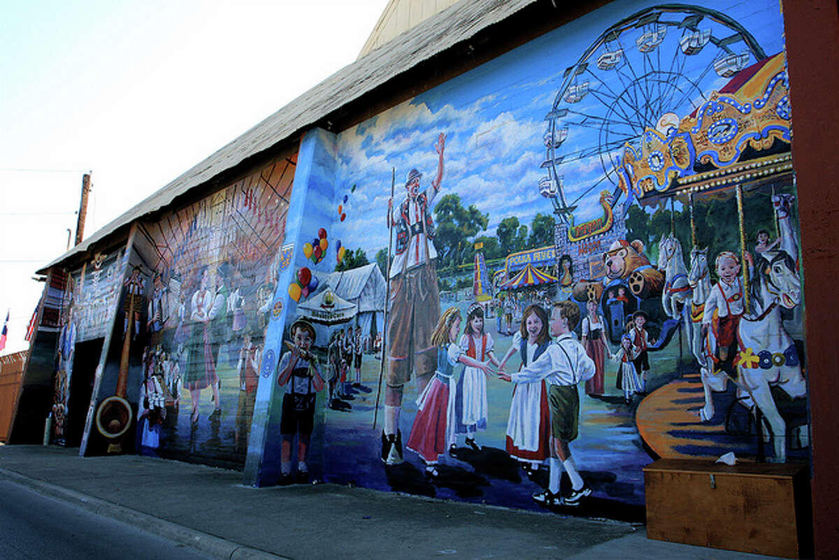 This "Windows into Wurstfest" mural is displayed at an entrance into Wurstfest in New Braunfels. The mural pays homage to the annual 10-day festival that includes food, beer and music. CORRECTION: This mural was previously reported as being displayed at the Comal County Fairgrounds.
