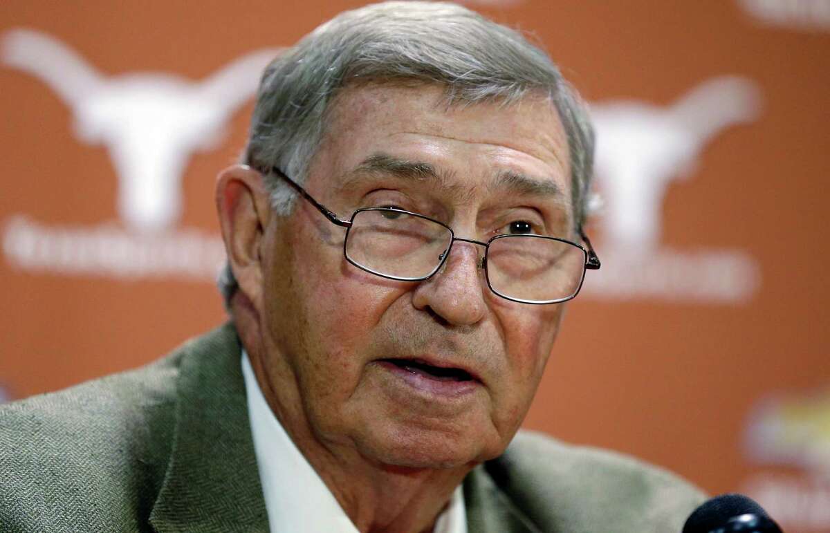In this Oct. 1, 2013 file photo, Texas athletic director DeLoss Dodds formally announces his retirement during a news conference in Austin, Texas. A person with knowledge of the offer says Arizona State athletic director Steve Patterson has accepted the athletic directors job at the University of Texas.