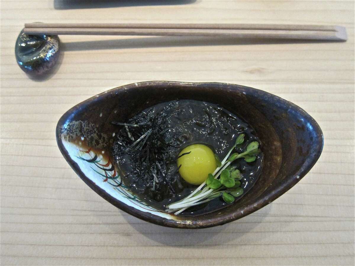MF Sushi: Black seaweed salad with egg yolk and freshly grated horseradish