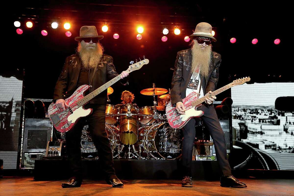 Dusty Hill, Frank Beard and Billy Gibbons of ZZ Top perform at the Fayette County Fairgrounds on September 5, 2015 in La Grange, Texas. (Photo by Gary Miller/Getty Images)