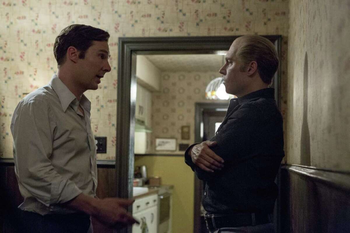 Benedict Cumberbatch and Johnny Depp star as the Bulger brothers (Bill and Whitey, respectively) in "Black Mass." (Claire Folger/Warner Bros. Entertainment/TNS)