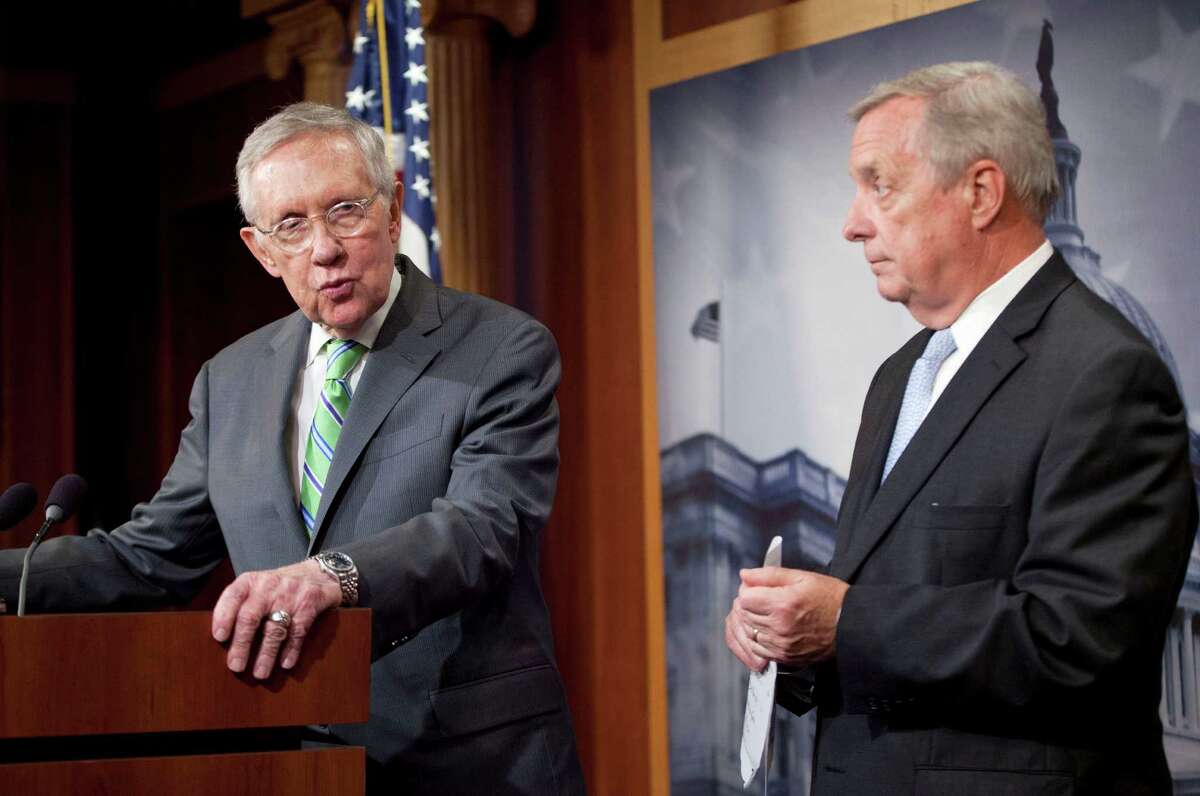 FILE - In this Sept. 10, 2015 file photo, Senate Minority Leader Harry Reid of Nev., and Senate Minority Whip Richard Durbin of Ill., participate in a news conference on Capitol Hill in Washington. Senate Republicans on Tuesday pushed for a final say on the Iran nuclear deal before the congressional review period expires, but Democrats were poised to stop any attempt to undercut the international accord and President Barack Obama?’s win on a top foreign policy initiative. (AP Photo/Pablo Martinez Monsivais, File) ORG XMIT: WX108
