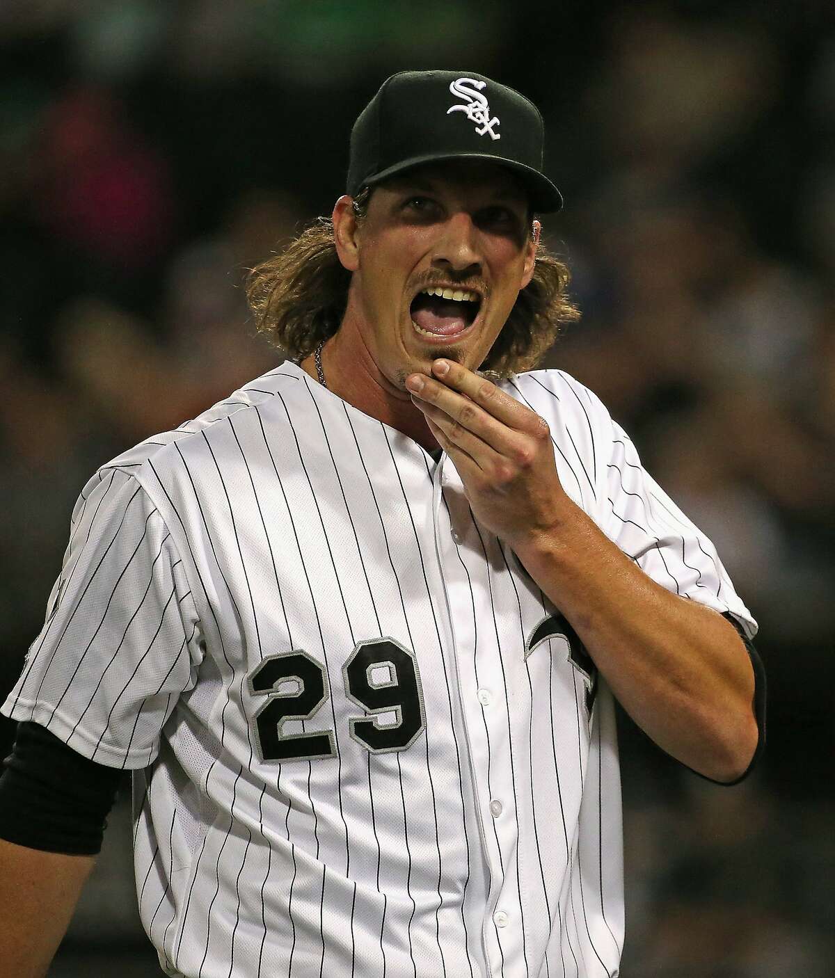 CHICAGO, IL - SEPTEMBER 15: Starting pitcher Jeff Samardzija #29 of the Chicago White Sox reacts as he leaves the field after the top of the 1st inning after giving up 5 runs to the Oakland Athletics at U.S. Cellular Field on September 15, 2015 in Chicago, Illinois. (Photo by Jonathan Daniel/Getty Images)