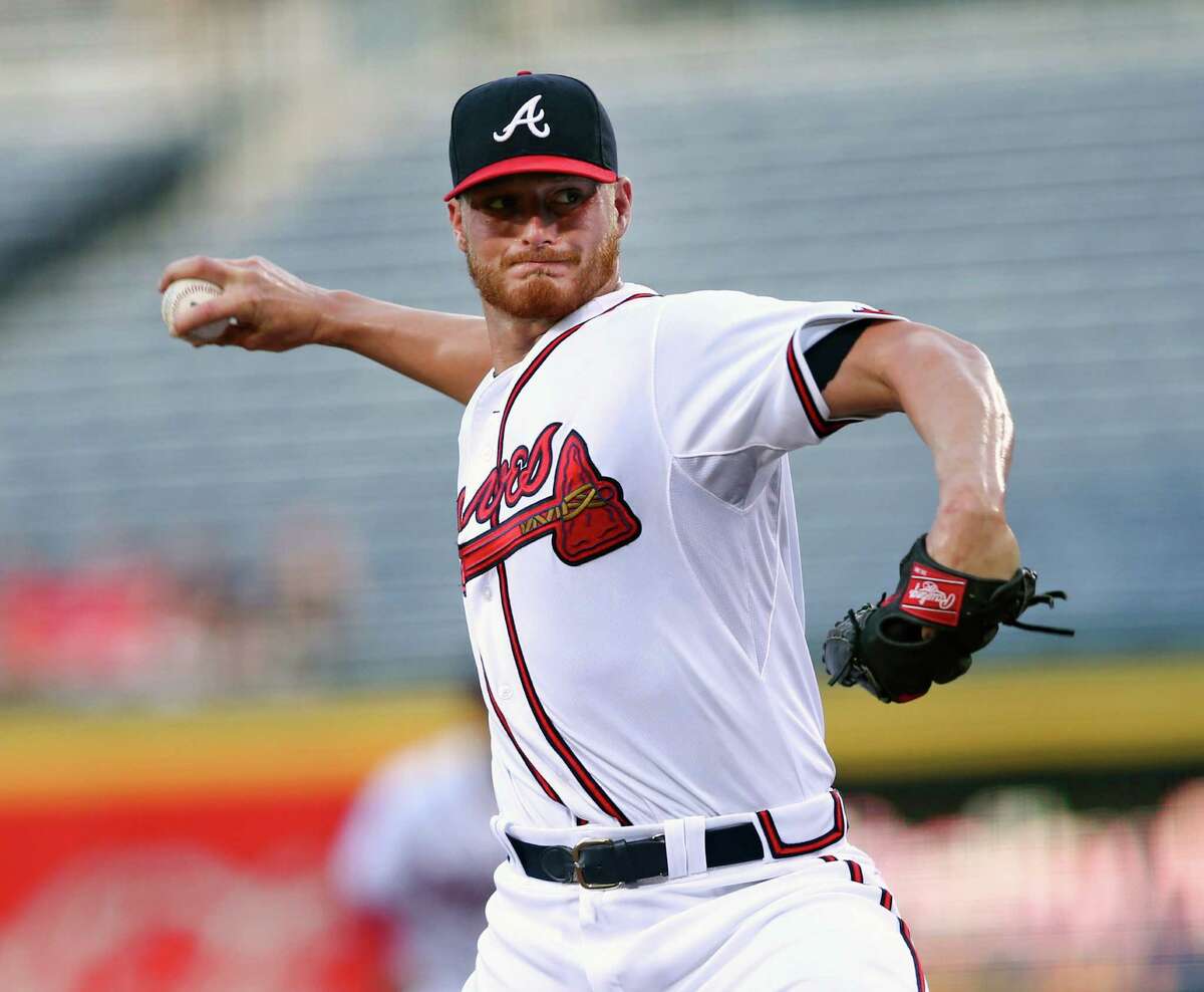 Atlanta Braves starting pitcher Shelby Miller (17) works in the first inning of a baseball game against the Miami Marlins Monday, Aug. 31, 2015, in Atlanta. (AP Photo/John Bazemore)