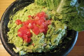 For SA Life Just A Taste: Tableside guacamole at Lupe Tortilla.