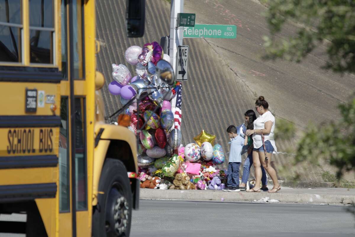 A day after a school bus crash, donations were added to a memorial honoring the teens hurt and killed in the accident.