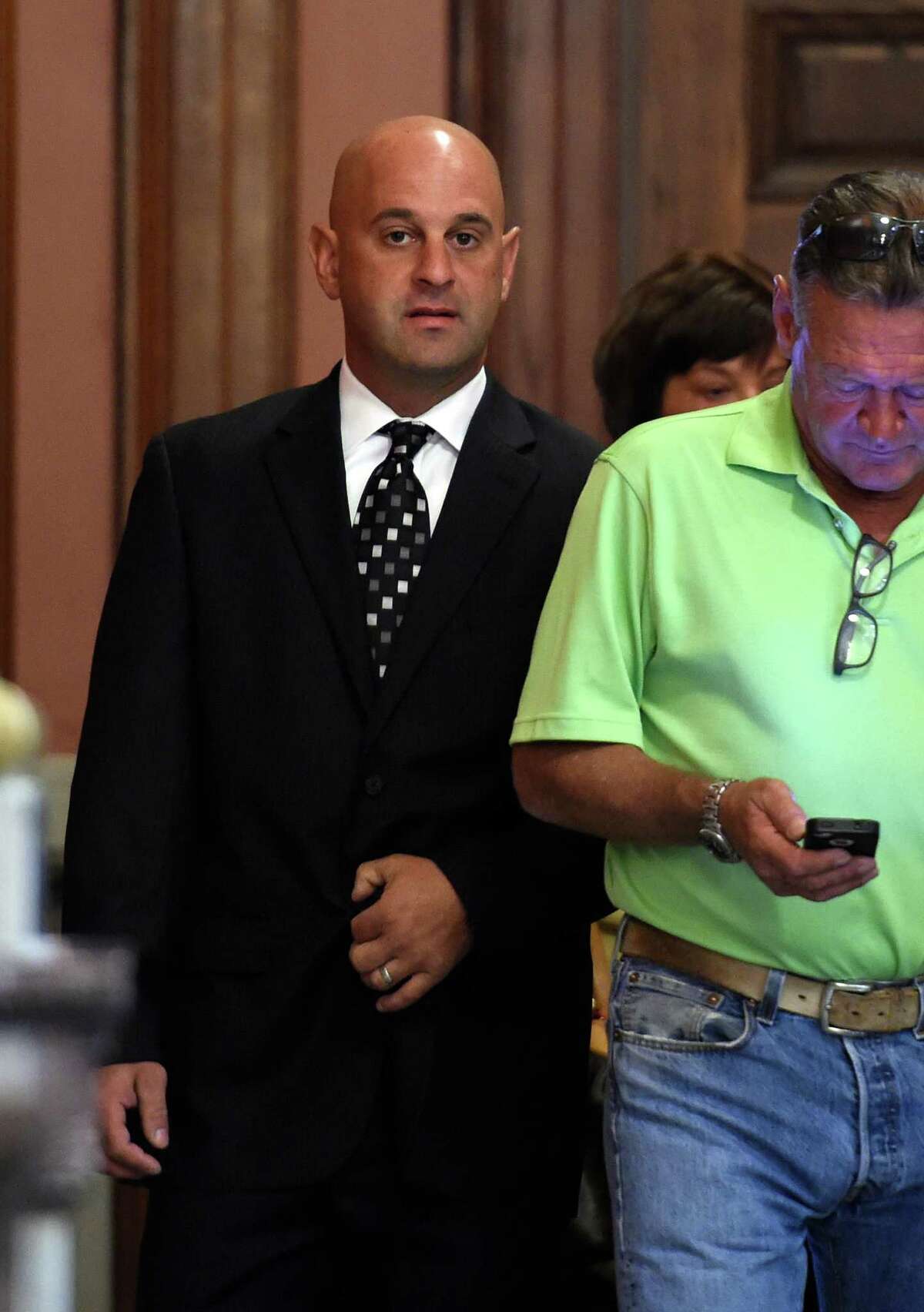 Former Troy Police officer Brian Gross arrives for his sentencing in Rensselaer County Court Thursday morning Sept. 17, 2015 in Troy, N.Y. Brian Gross, 33, of North Greenbush, who was assigned to the Community Narcotics Enforcement Team, was sentenced by Judge Andrew Ceresia. In June, Gross admitted his guilt to Ceresia during a plea. (Skip Dickstein/Times Union)
