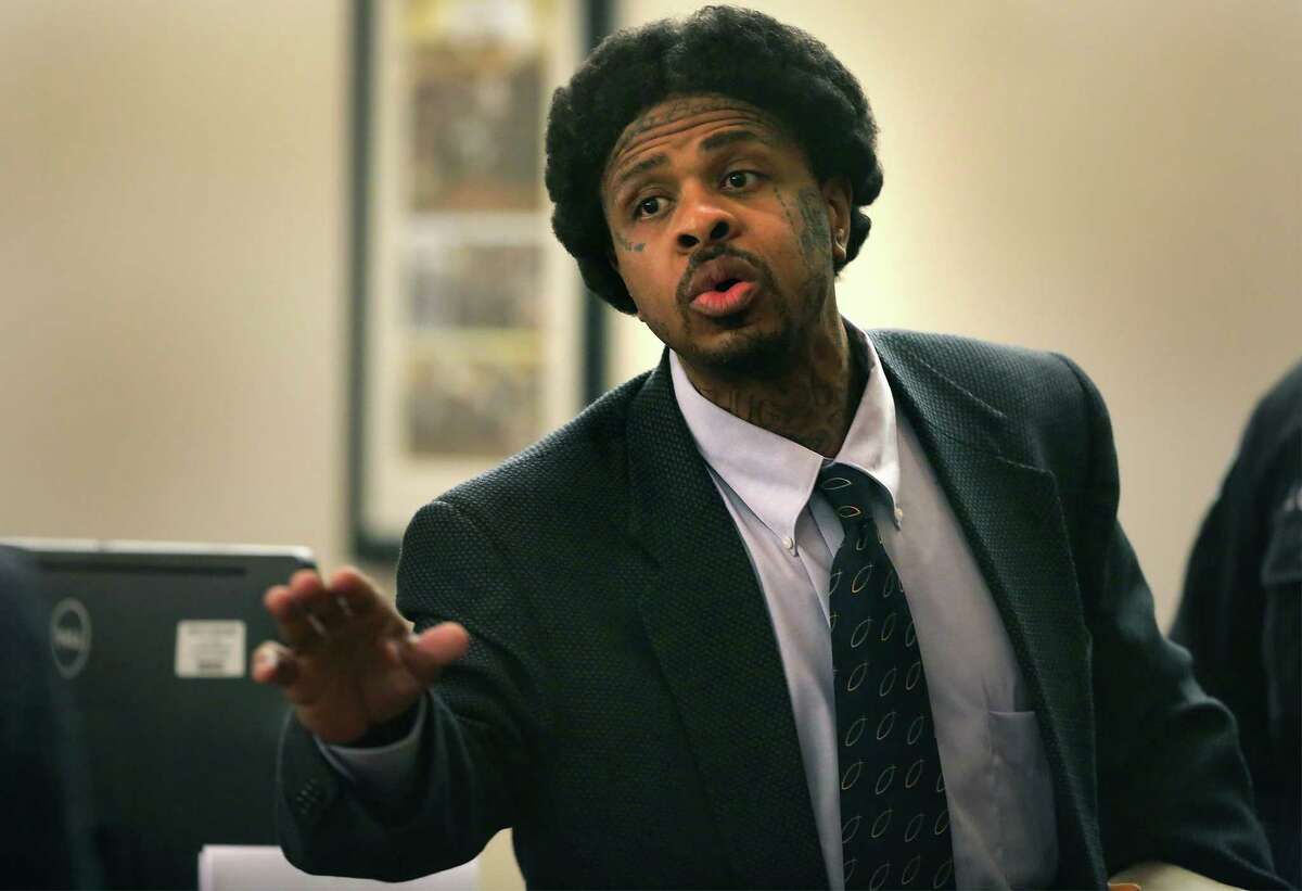 Glen Dukes, already with two life sentences for forcing five women into prostitution, outbursts at his lawyer Cornelius Coxin the 379th state District Courtroom at the Cadena-Reeves Justice Center for saying Dukes pleaded not guilty at the beginning of his capital murder trial on Tuesday, Sept. 15, 2015. Dukes turned and headed to leave the courtroom through the baliff's door.