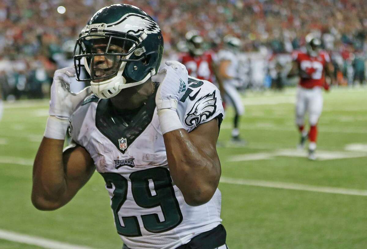 Philadelphia Eagles running back DeMarco Murray (29) celebrates his touchdown against the Atlanta Falcons during the second half of an NFL football game, Monday, Sept. 14, 2015, in Atlanta. (AP Photo/John Bazemore)