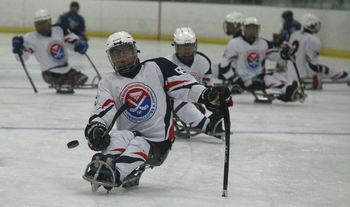 The South Korean paralympic hockey team practices Thursday September 17, 2015 at the Ice and Golf Center at Northwoods. The team had a scrimmage with the San Antonio Rampage sled hockey team and is preparing for the 2018 Winter Paralympics in Pyeongchang, South Korea.