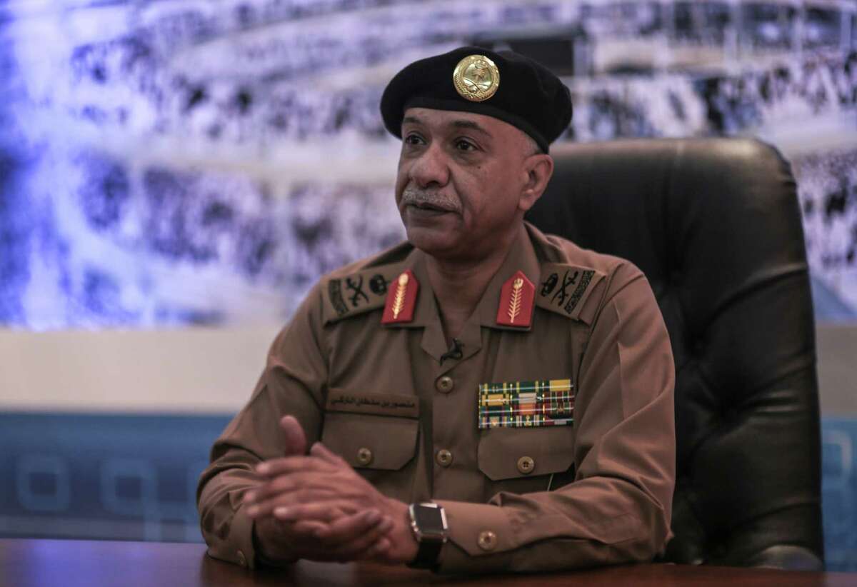 Saudi Interior Ministry spokesman Maj. Gen. Mansour al-Turki speaks during an interview with The Associated Press at a security monitoring center in Mecca, Saudi Arabia, Saturday, Sept. 19, 2015. (AP Photo/Mosa'ab Elshamy)