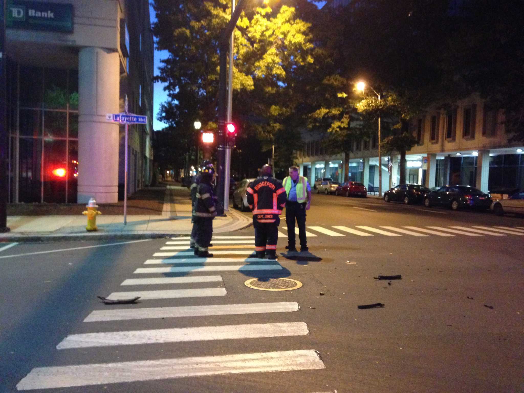 Two hurt in crash at busy intersection