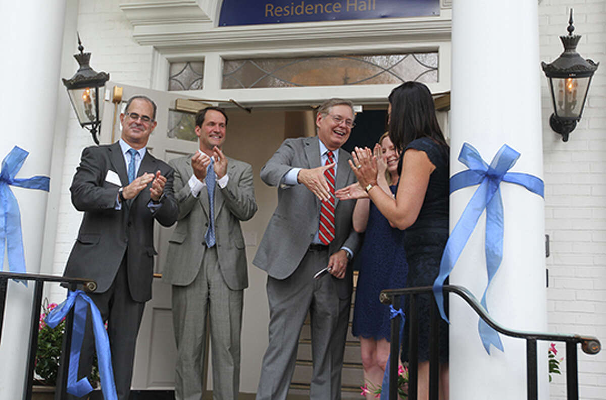 The Beacon School, Stamford's first school for gifted education, recently celebrated its opening in the city. Pictured, from left, Eric Kaye, chairman of the Greenwich Education Group's School Foundation; U.S. Rep. Jim Himes, Mayor David Martin and Victoria Newman, founder and executive director, Greenwich Education Group.