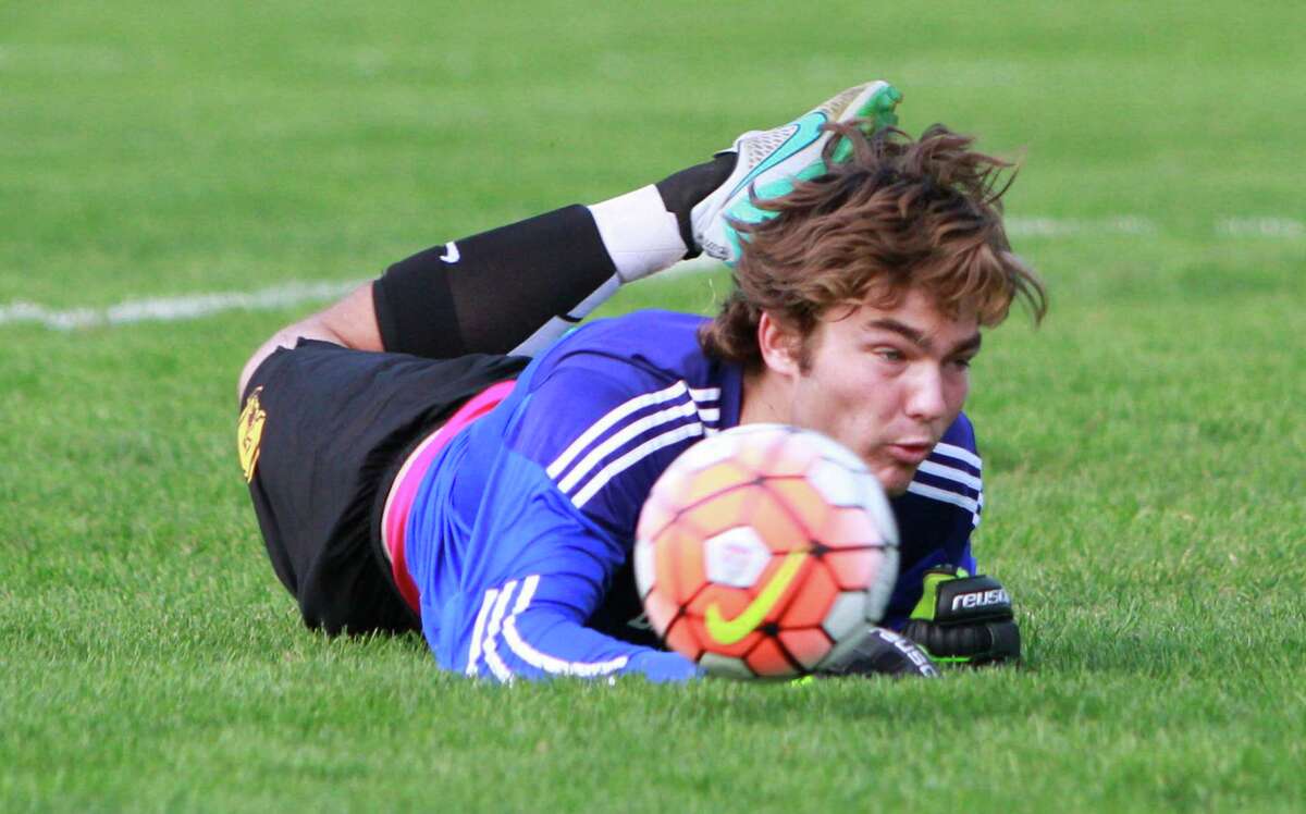 Brunwick goalie Wilson Solomon makes a save in front of the goal against Loomis Chaffee during a varsity soccer match at Brunswick Academy in Greenwich, Conn. on Sept. 21, 2015. Brunswick defeated Loomis Chaffee 4-1.